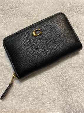Coach Black Pebbled Leather Zip Card Holder with Gold 'C' Accent